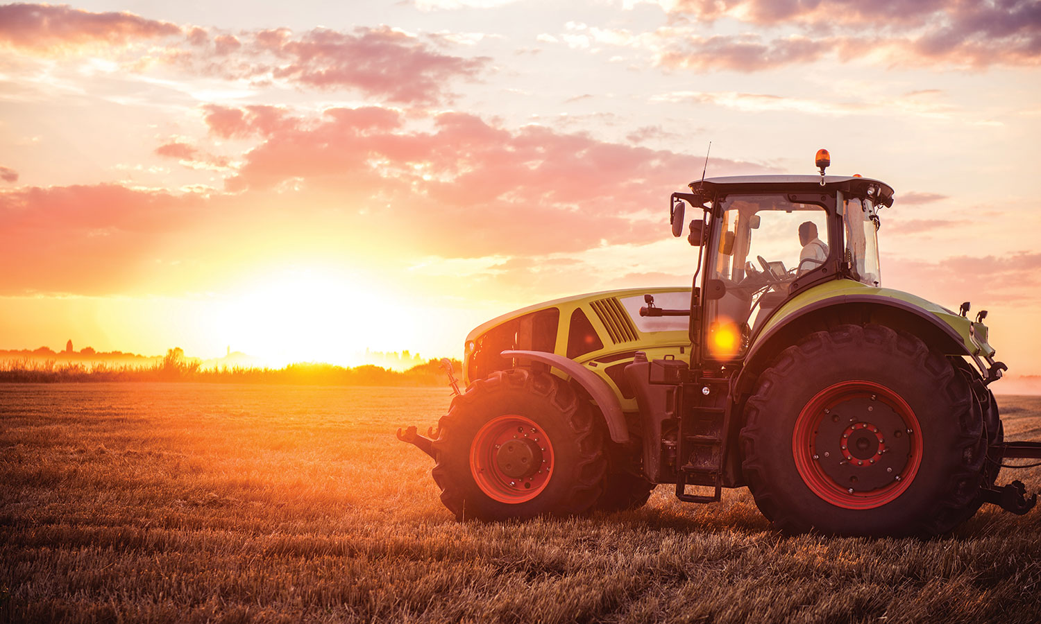 Tractor at sunset