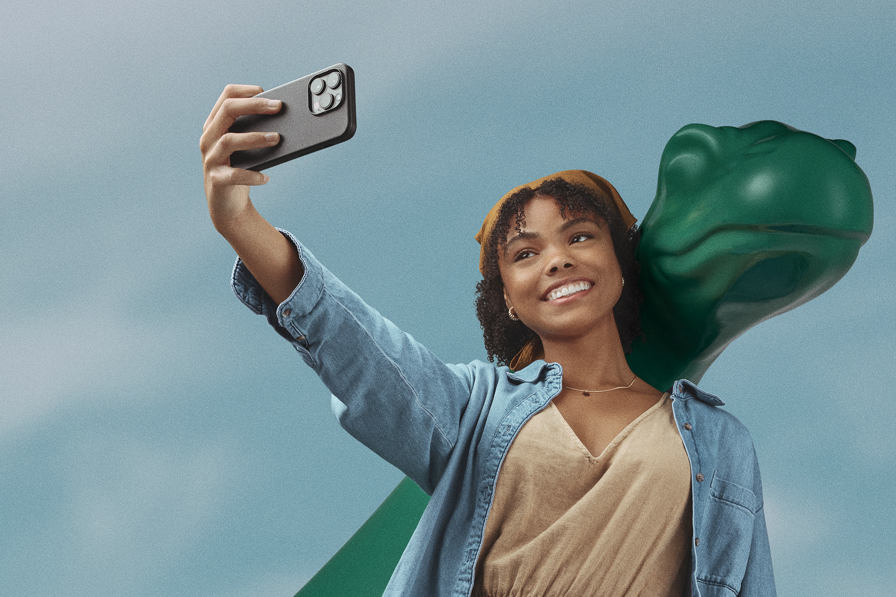 Women taking selfie on phone with Sinclair DINO