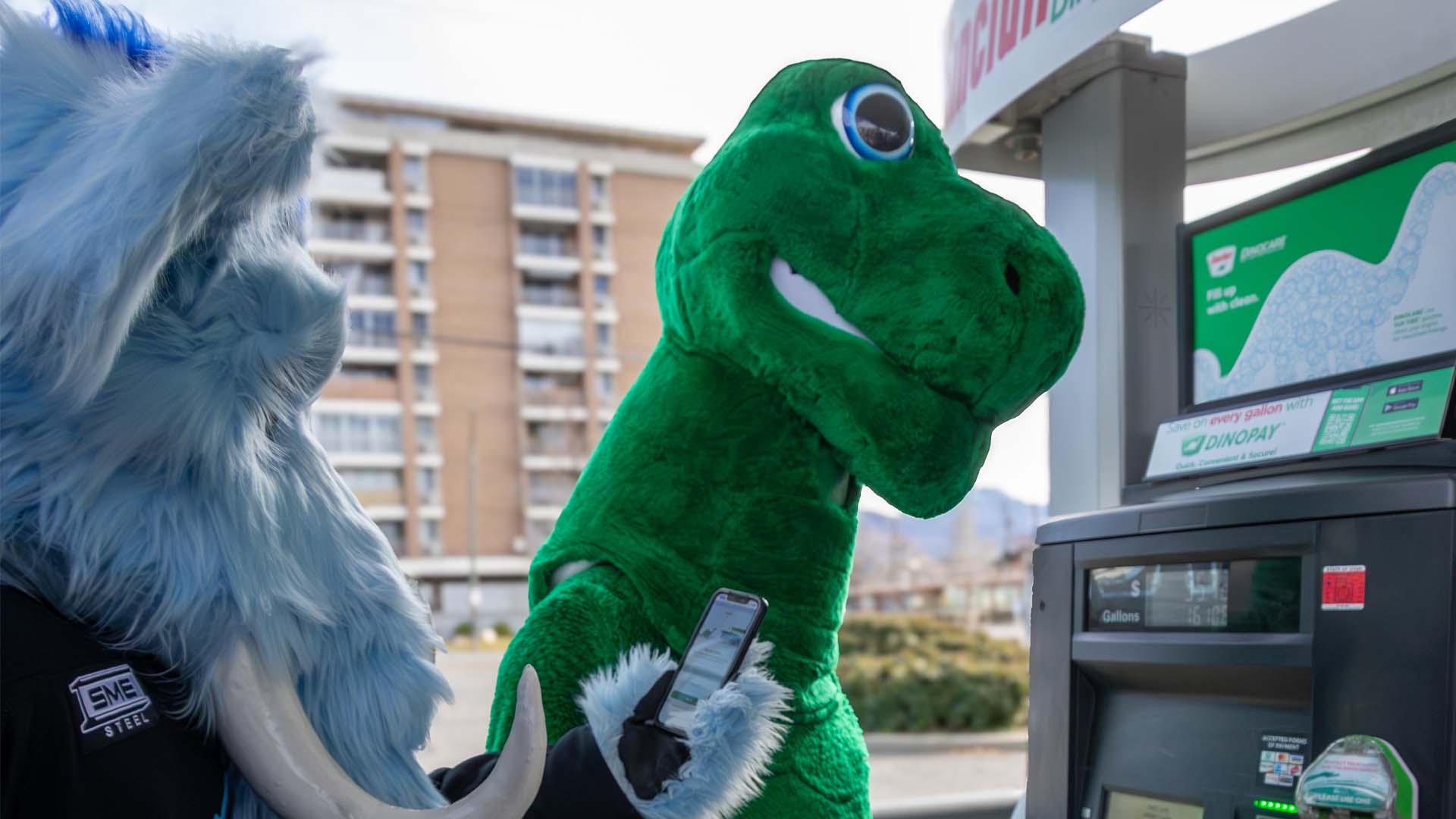 Dino and Tusky use Dino Pay