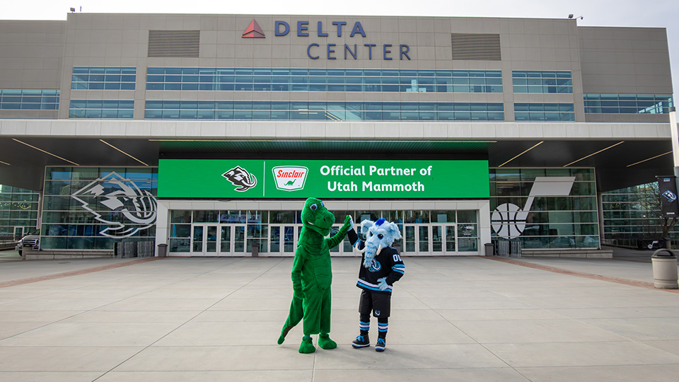 Dino and Tusky High Five