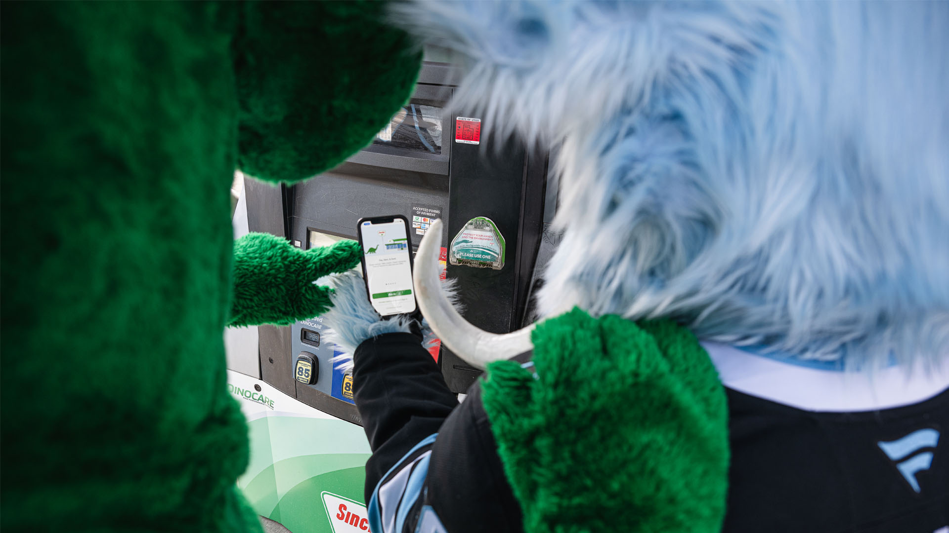 Dino and Tusky using Dino pay