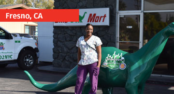 Person posing with DINO in Fresno, CA