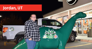 Person posing with DINO in Jordan, UT