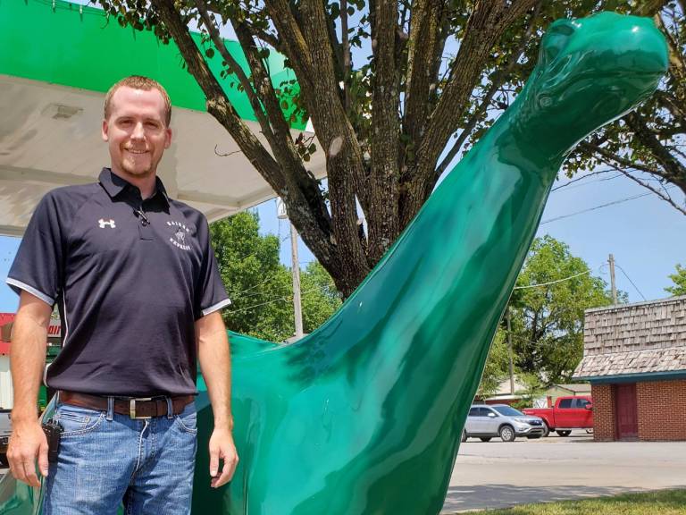 man standing with DINO